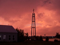 Sunset behind Church steeple photo thumbnail