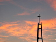 Sunset behind Church steeple photo thumbnail